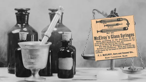 McElroy Glass Syringe Vintage Ad