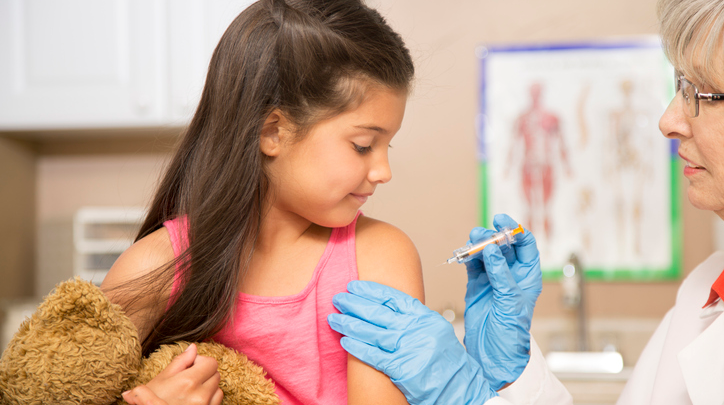 Young Girl Receiving Vaccine